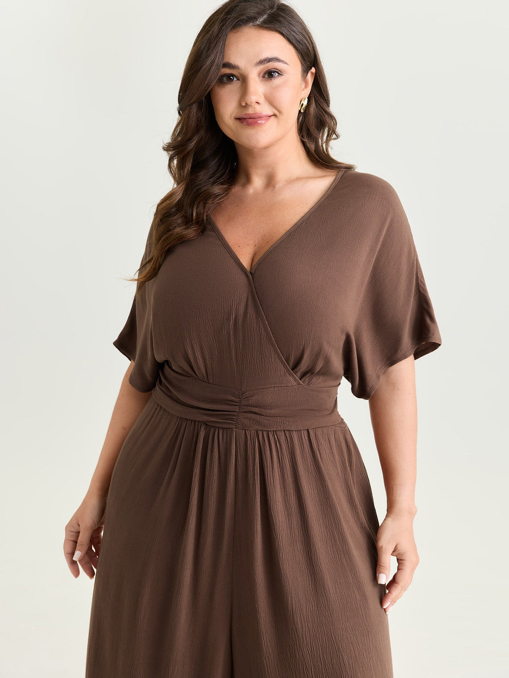 Textured Pleated Waist Surplice Jumpsuit