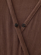 Textured Pleated Waist Surplice Jumpsuit